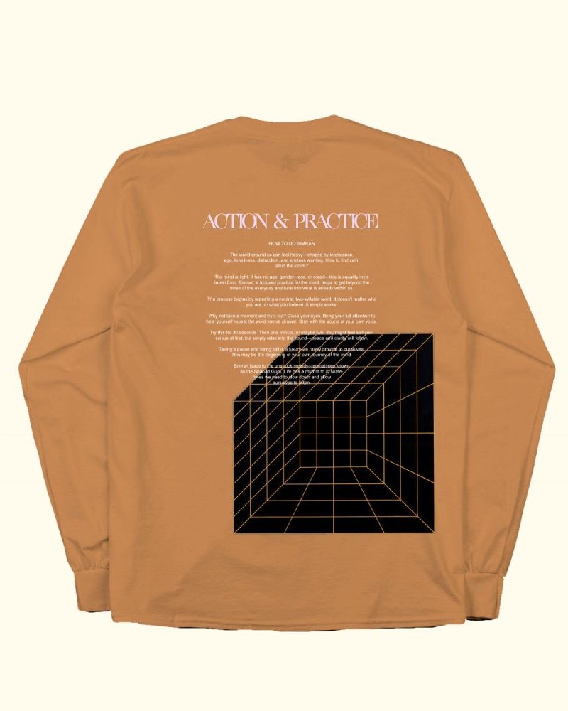 Back of the shirt: Action and Practice, a text on how to do Simran, above a navy grid cube